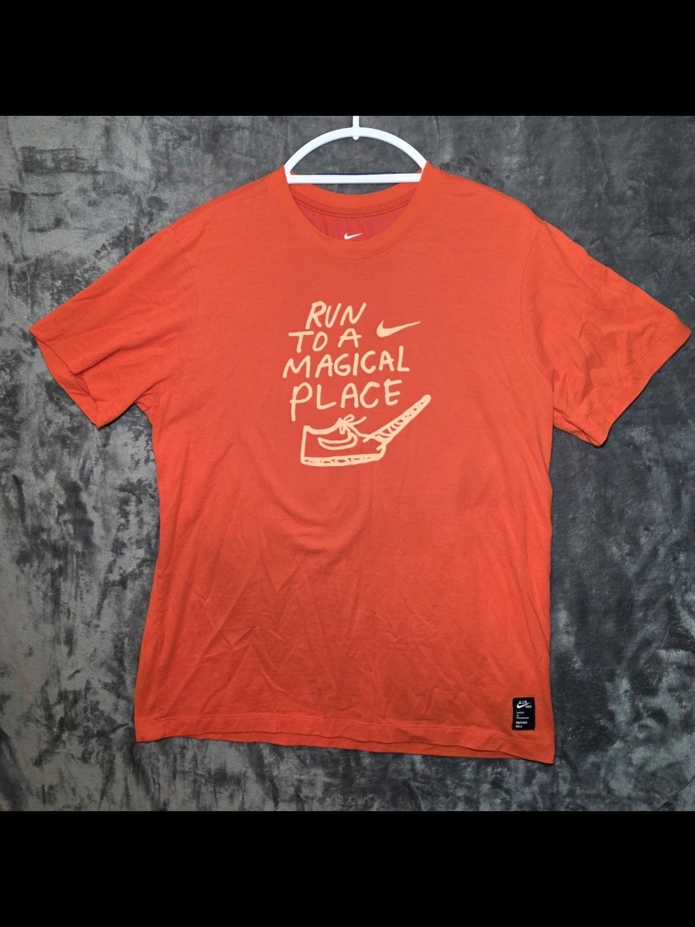 Nike Men’s Orange Crewneck Graphic Tee - 'Run to a Magical Place'